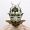 A portrait shot of a face with a bat mask.