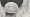 A drawing of a UFO between two large rock formations.