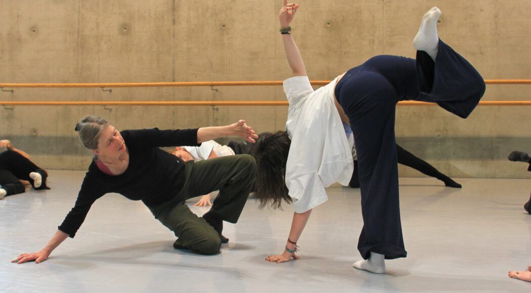 Two people dancing in a floor figure